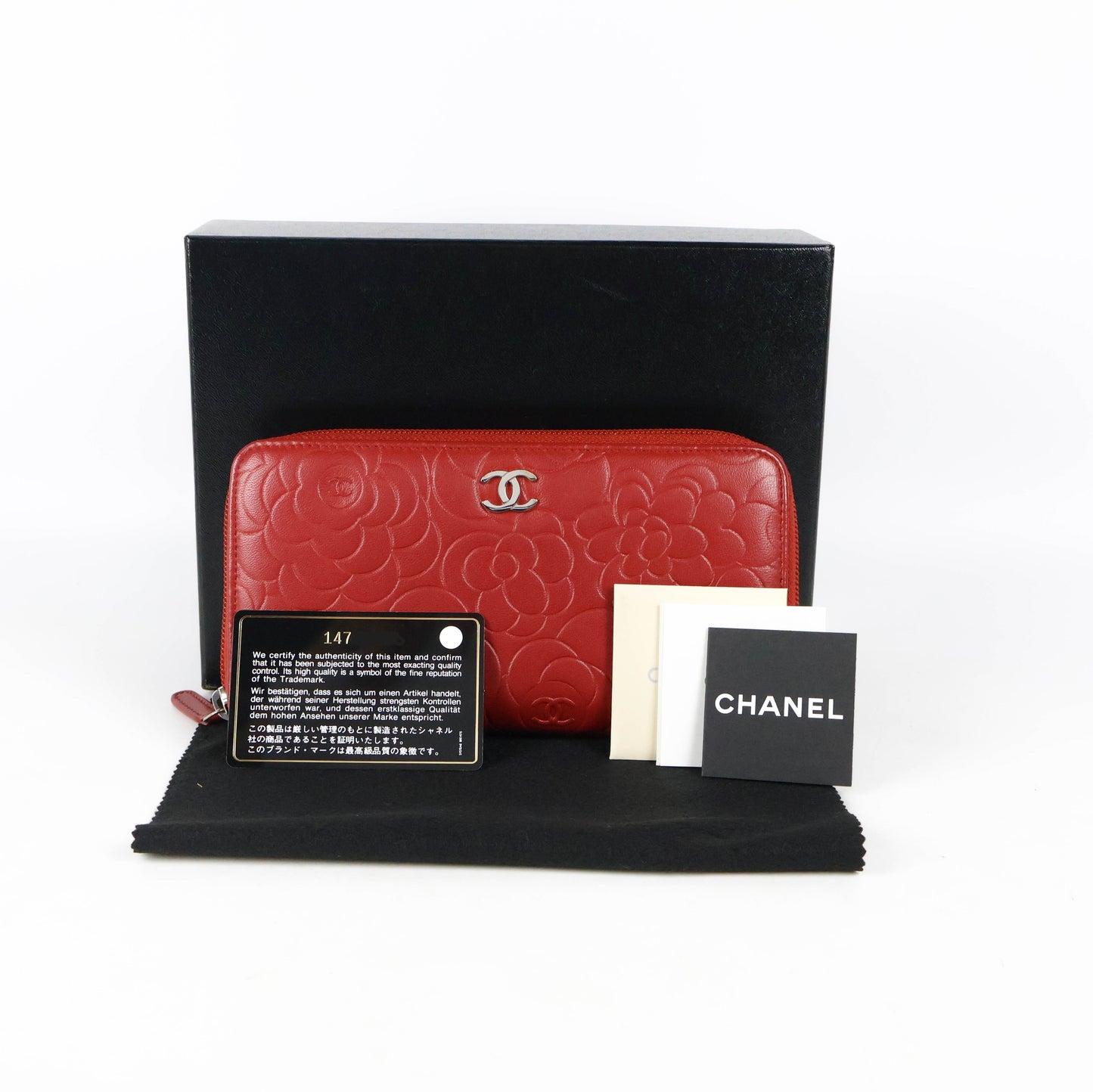 Chanel Lambskin Camellia Zippy Wallet Red